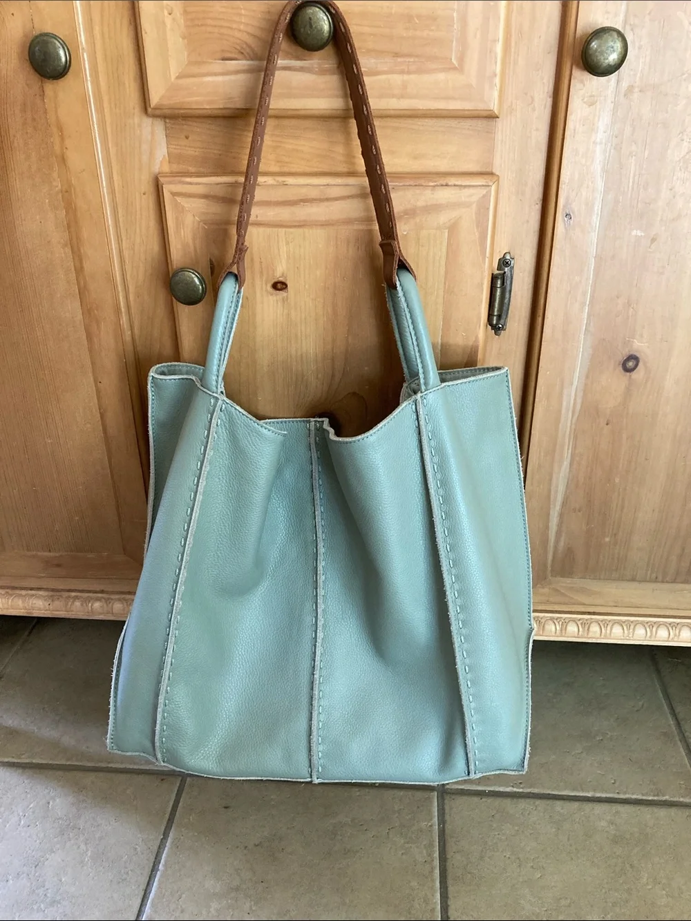 The Sak Leather Tote Bag in Light Sage with Contrast Brown Handles
